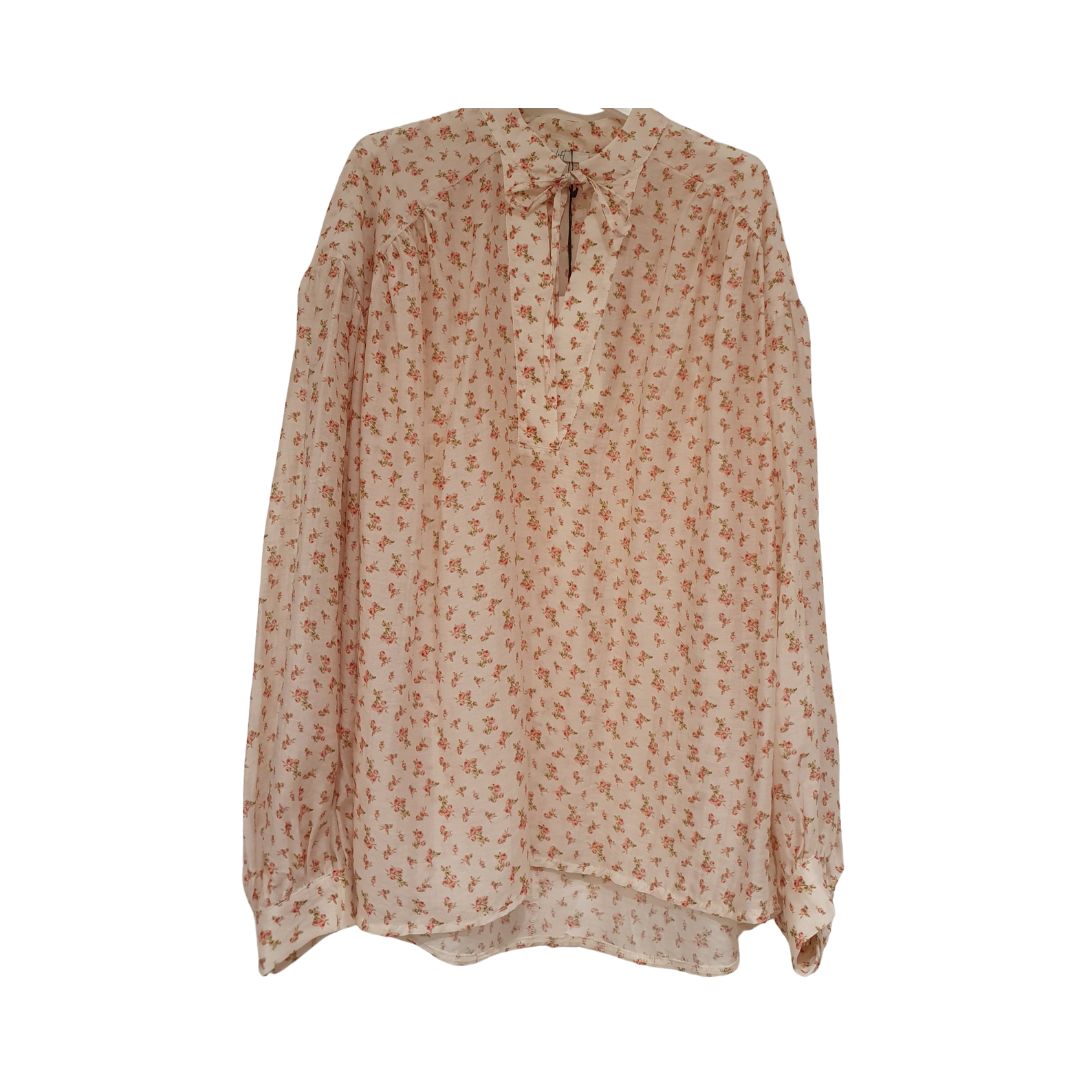 Blusa floreale over Philia Loft