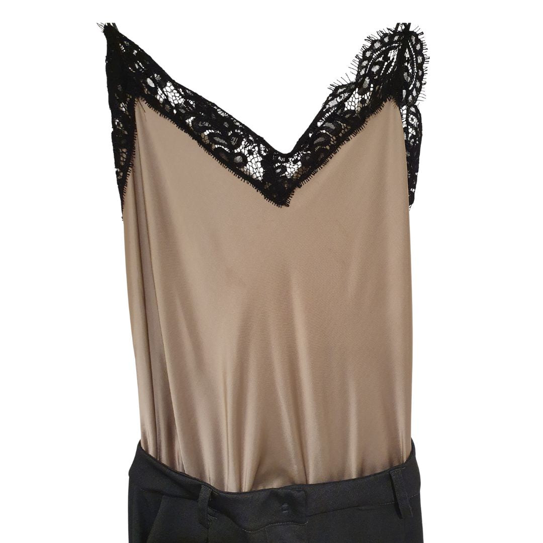 Tuta con top in pizzo e pantalone jogging Souvenir